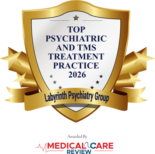 Medical Care Review award shield naming Labyrinth Psychiatry Group a Top Psychiatric and TMS Treatment Practice 2026